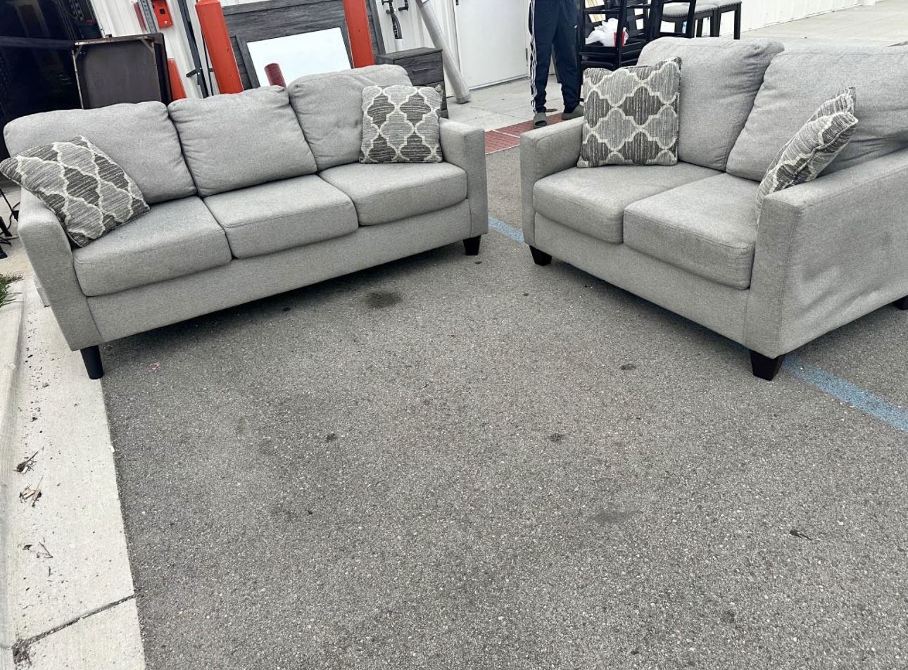 Gray Couch and loveseat
