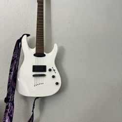 White Mitchell Guitar with Purple lighting Strap