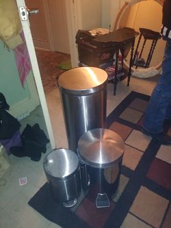 3 stainless garbage cans