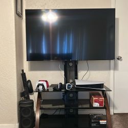 TCL 55” Roku TV And Stand