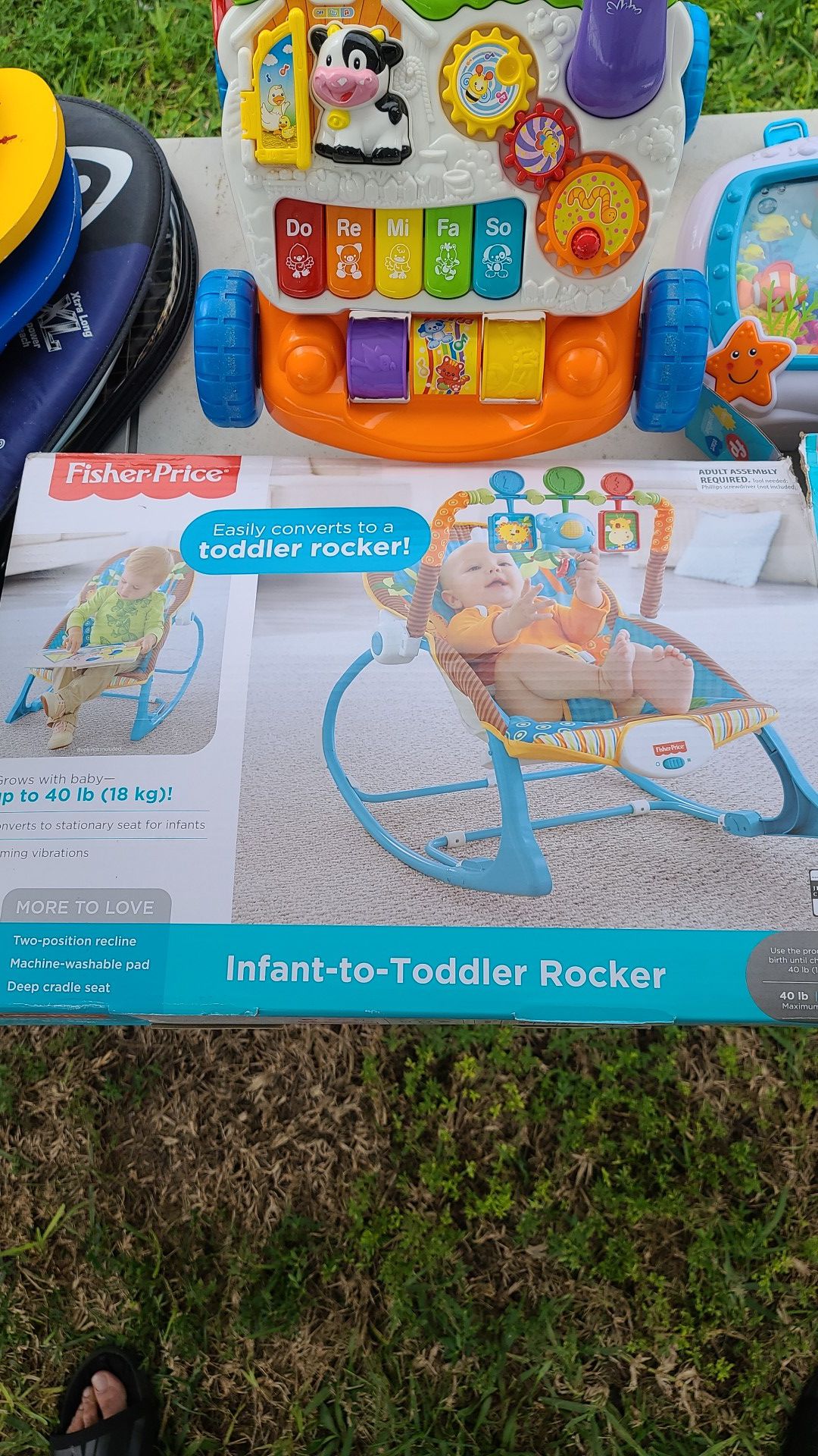 BRAND NEW INFANT/TODDLER ROCKER + TOYS