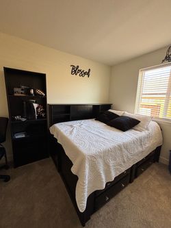 Bed with cabinet