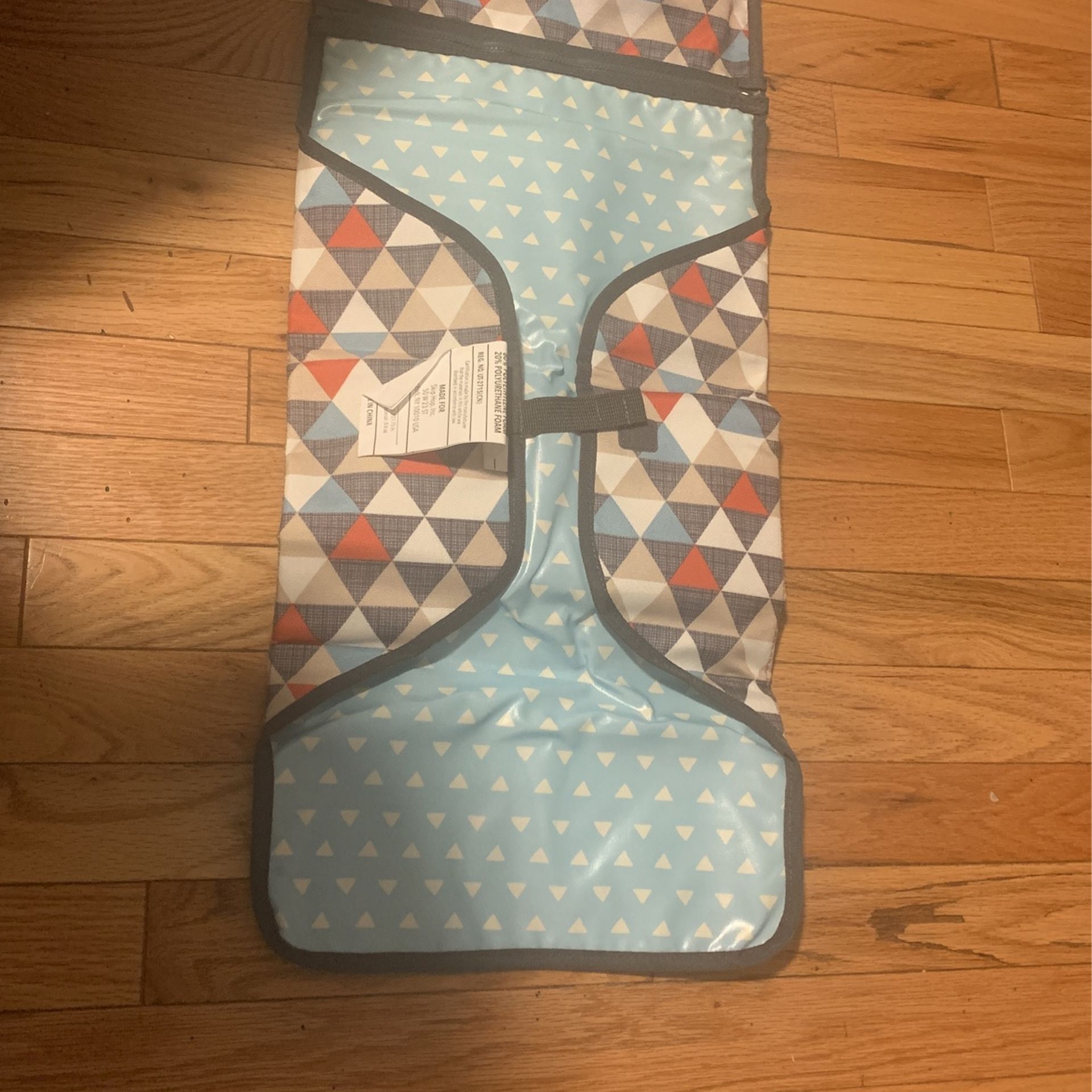 New baby changing pad with wipe holder