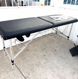 Massage table