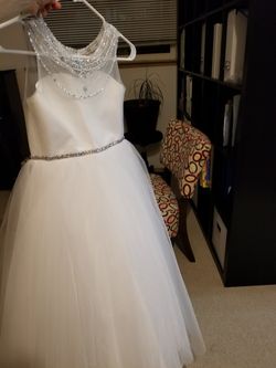 Flower girl dress with sparkling belt. Sleeveless