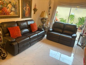 For sale Reclining sofa and loveseat in synthetic leather
