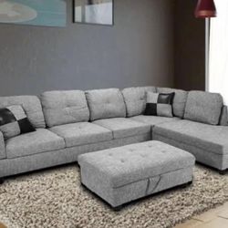 Gray linen sectional couch and ottoman