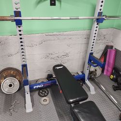 Used bench press with weights for sale sale