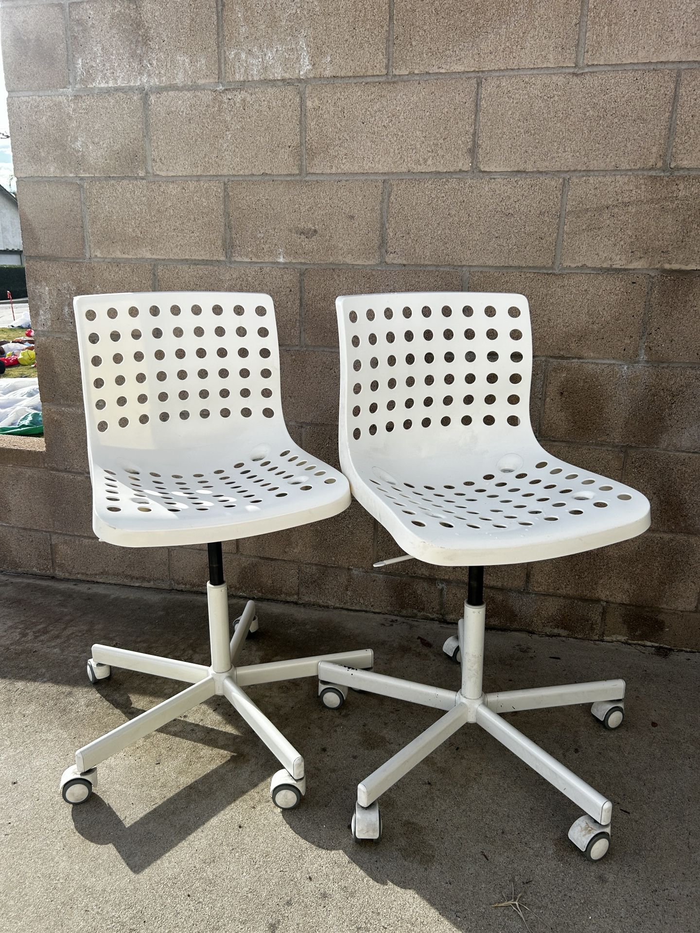 Two White Ikea Swivel Desk Chairs