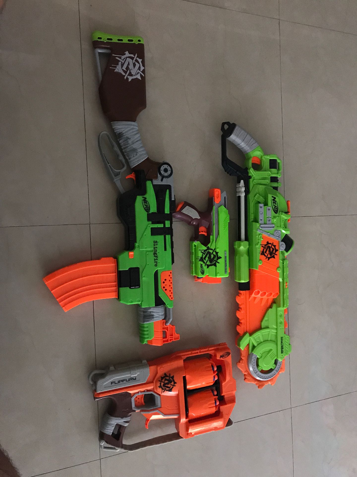Lot of 4 NERF guns zombie strike edition