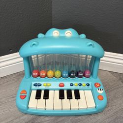 B. toys–Hippo Pop–Musical Toy Keyboard – Play Piano – Songs, Sounds & Lights – Musical Instrument