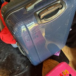 Large blue suit case .