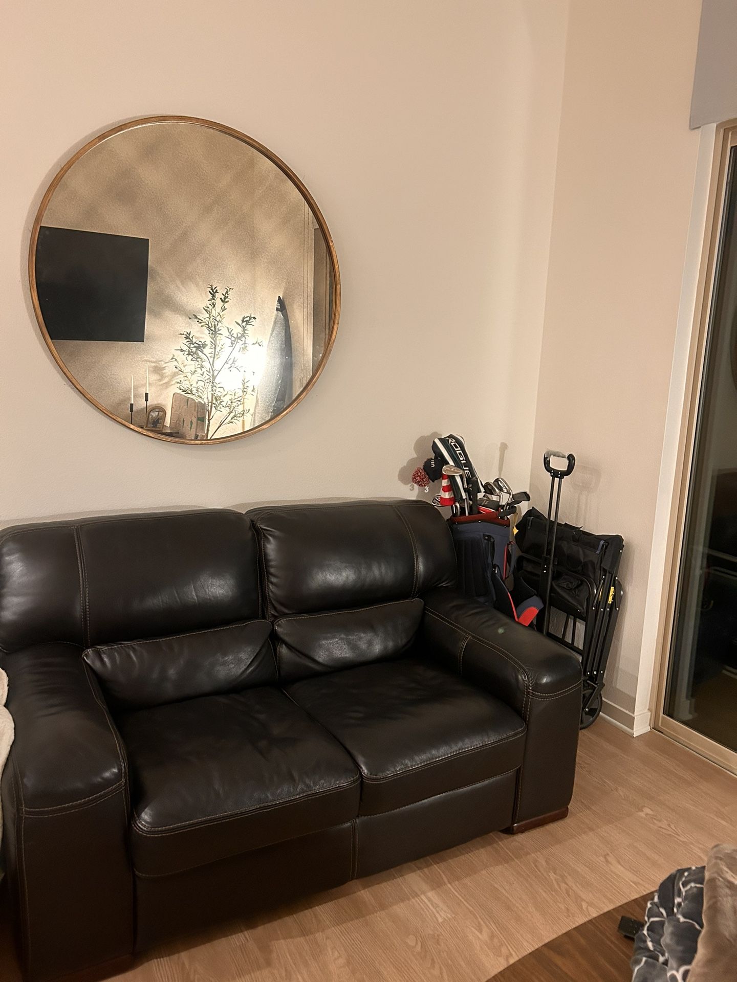 Black Leather Couch - $350 (Living Spaces)