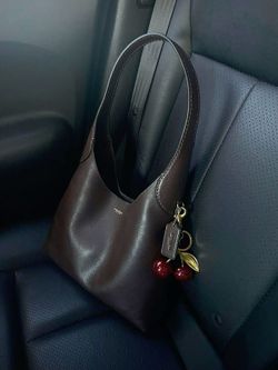 Brand new Coach Brooklyn HandBag with Coach Cherry Charm