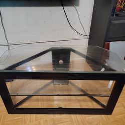 Two glass tables