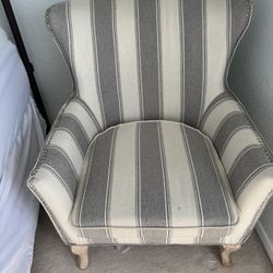 Armchair, Circular table, And Plant stands 