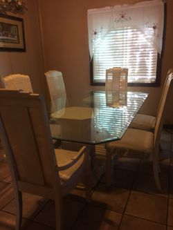 Glass table, wicker chairs,china with nothing inside included