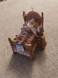Small snoozing Christmas Santa ornament (view all photos)