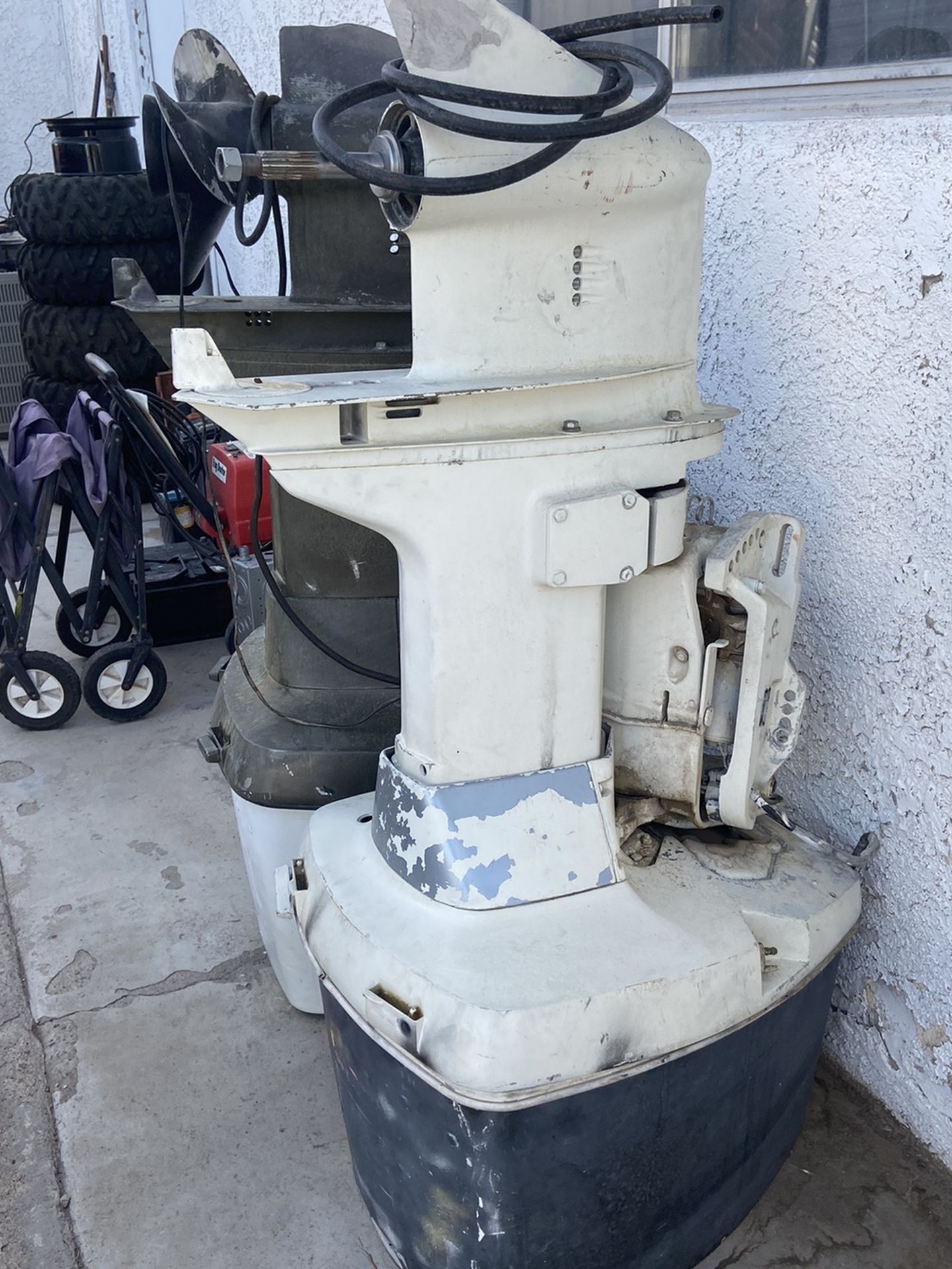 Two Outboard Motors, Evinrude 200hp and 155hp