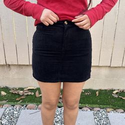 Small Black corduroy mini skirt