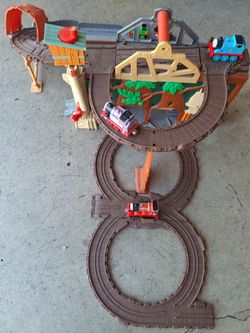 Tomas the train track set  include 4 trains $ 35.00  0BO