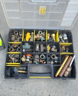 3 storage cases of assorted Plumbing Fittings, Electrical Fuses, and Hardware Organizers. Mostly new items.