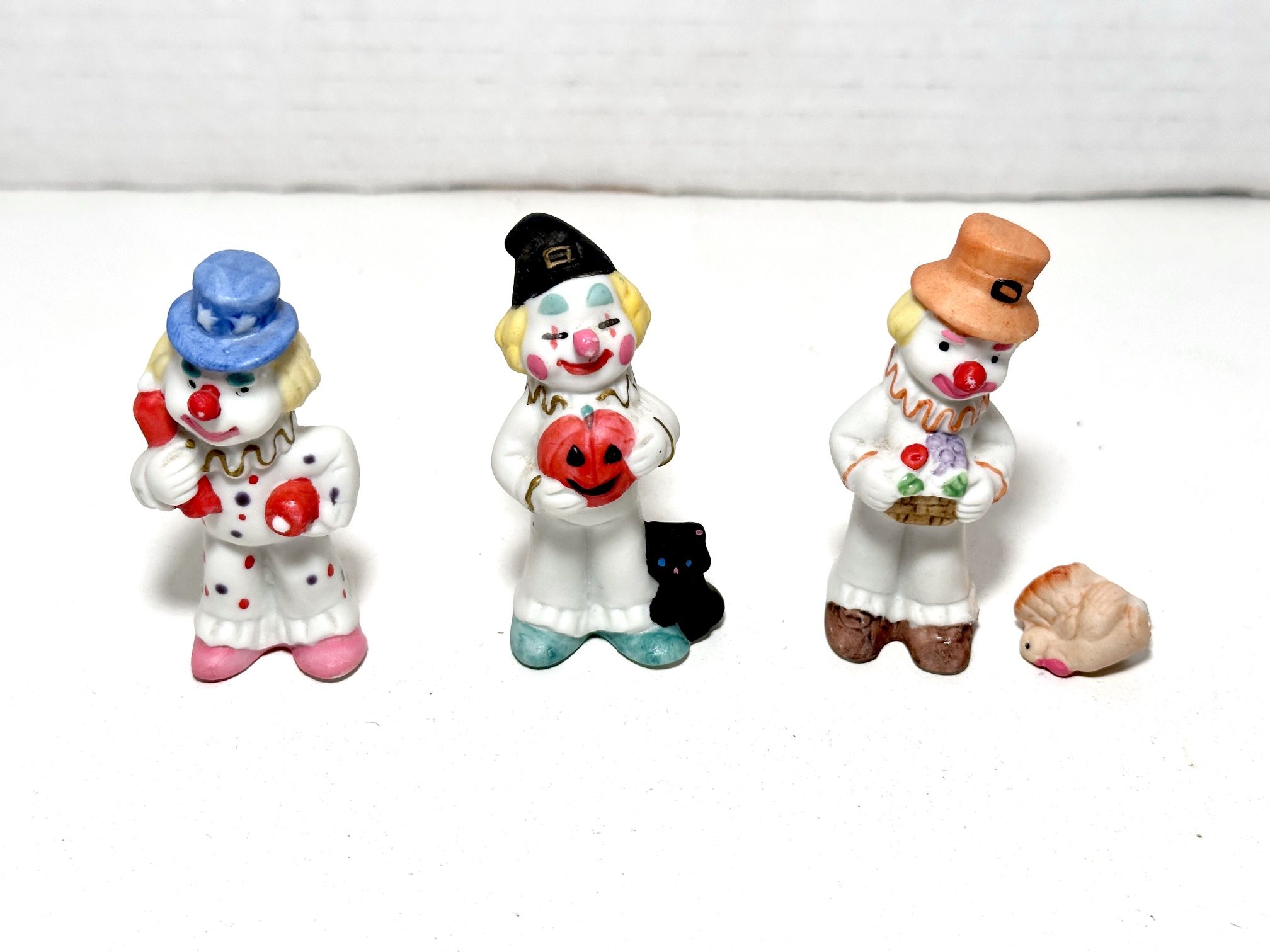 Vintage 1980s Napcoware “Clown of the Month” Bisque Porcelain Figurine Set of 3