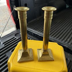 both brass candle holders 