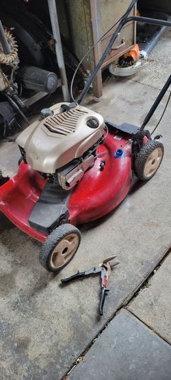 Push lawn mower slash sell propel