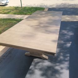 Large Extendable Dining Table with Pedestal Base