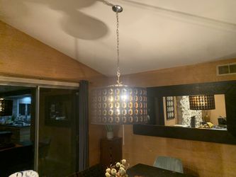 Brown and copper colored light fixture modern mid century