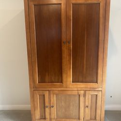 Entertainment Console With Folding doors and room for electronics