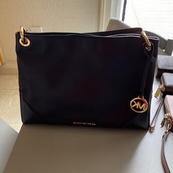 Michael Kors And Coach Wallet