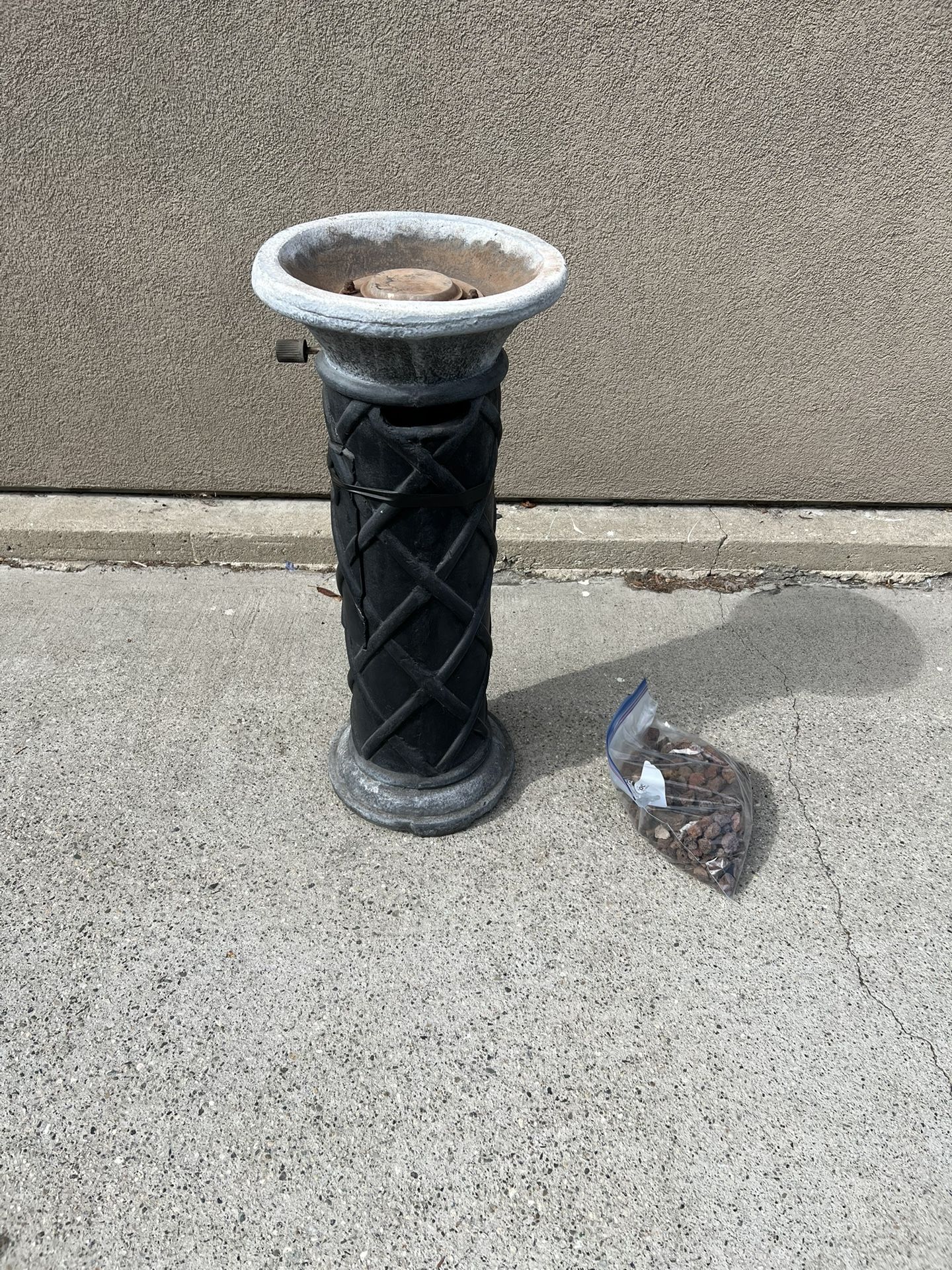 Yard fire pit decor with lava rocks