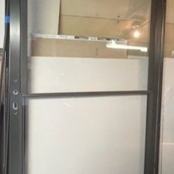 Self-Storing Storm Door 