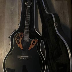 Acoustic/electric Round Back Celebrity Ovation Guitar