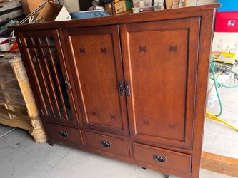 Wood Entertainment Center w/ bottom drawers & Glass door