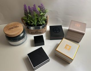 Luxury vintage storage jewellery boxes. Spiced candle, and decorative lavender to set the luxury mood.