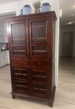 Tall wood cabinet