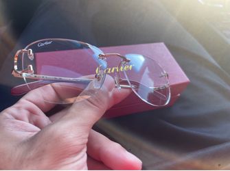 Cartier Glasses- clear Gold arms
