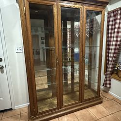 LARGE OAK AND BEVELED GLASS CHINA DISPLAY CABINET