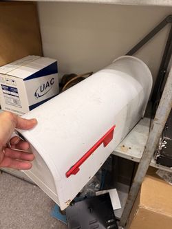 White Metal Post-Mount Mailbox with Red Flag