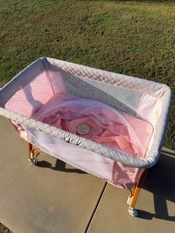 Pink Bassinet with Storage and Canopy cover