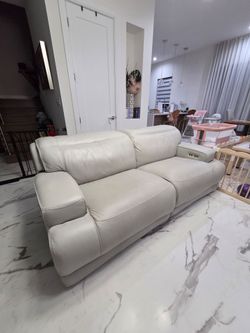 LEATHER RECLINER SOFA- LIKE NEW!