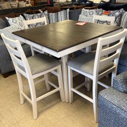 Brand new table and four chairs 599 firm cash only