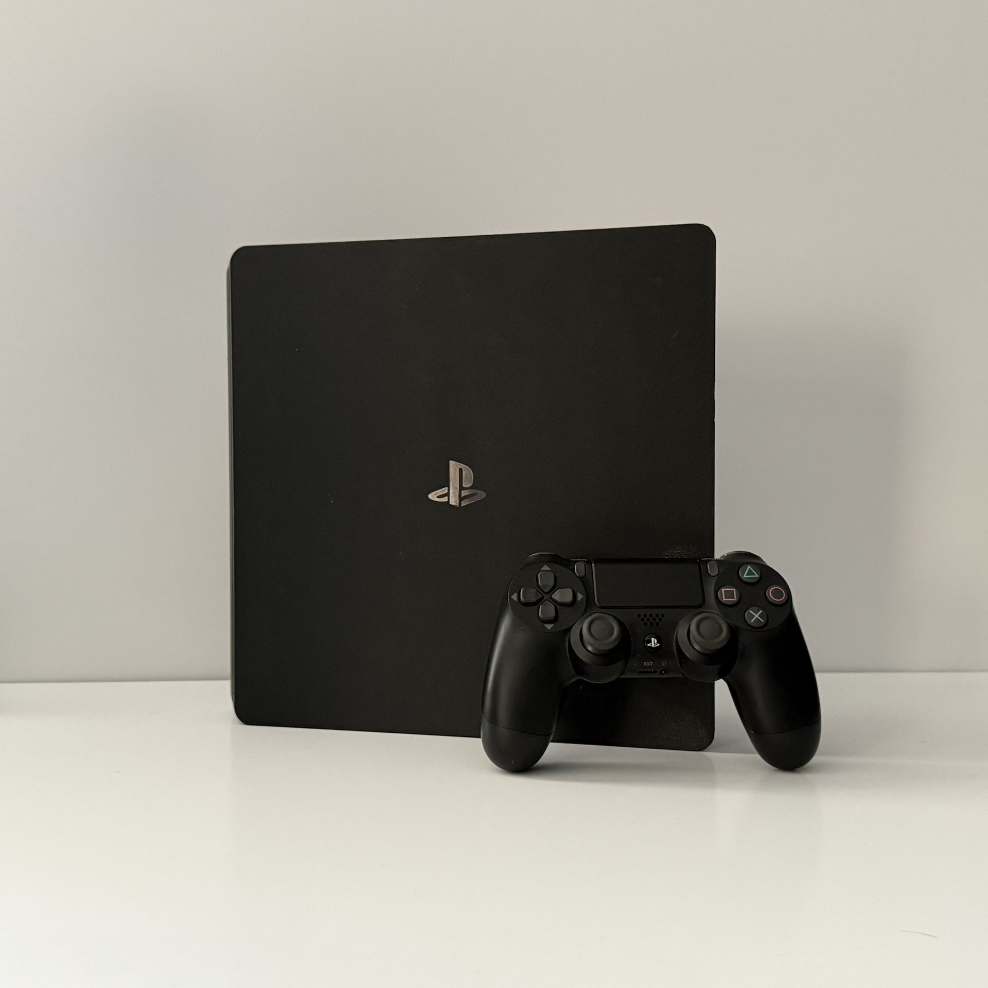1TB PS4 Slim in Good Condition w/ Controller