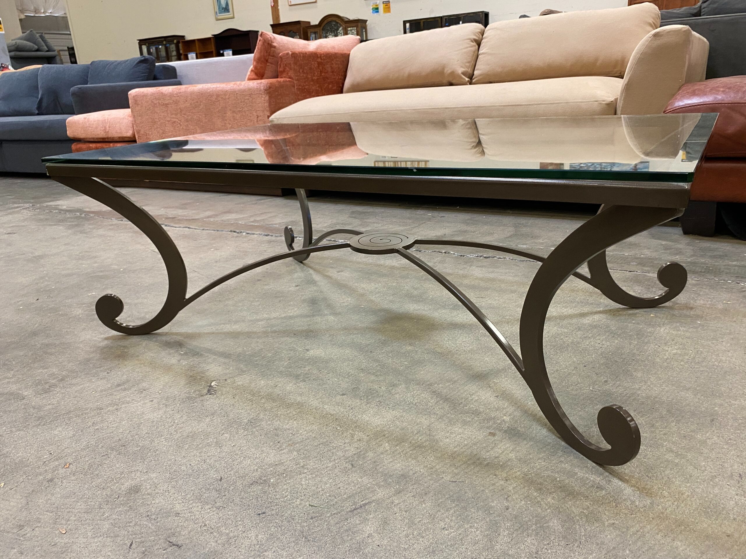 Wrought Iron Coffee Table with Glass Top and Spiral Accent