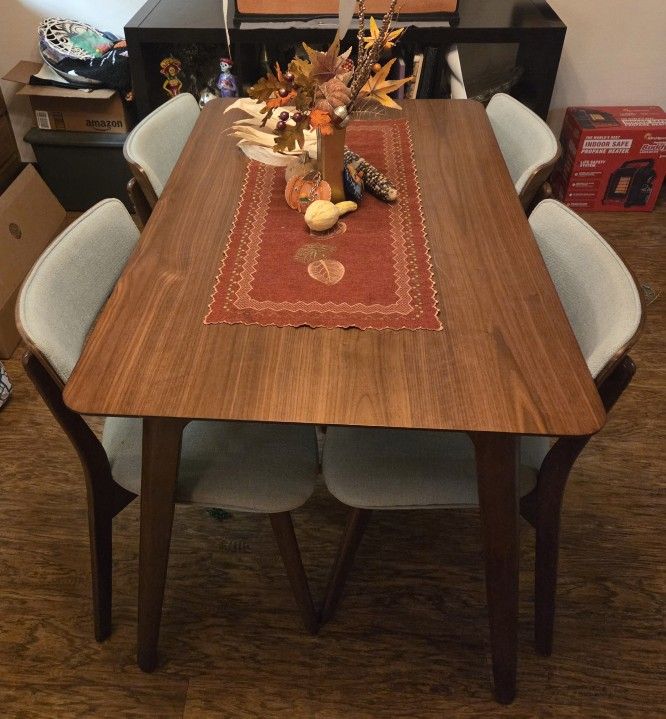 Cute Brown Dining Table And Light Blue Chairs