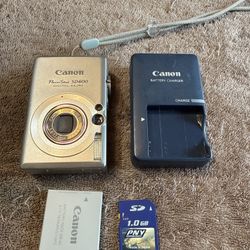 Canon PowerShot SD 600 Digital ELPH 6.0MP 3x Digital Camera - Silver with battery, 1 GB sd card and charger. Tested. Working great. 