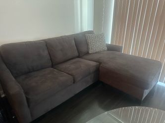 Gray sleeper sofa with lounge
